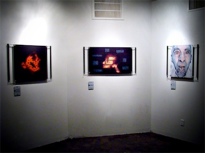 Cult of Ego | Installation Photo — Zooming back out a bit, showing three of the pieces. The rest of the pieces shown framed with horizontal mounting instead of vertical. I like the idea of the tension of something hanging with gravity coming in on them. I'm still stoked at this presentation and would love to do an upgraded version in a future installation.