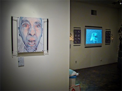 Cult of Ego | Installation Photo — The final shot in this gallery. You'll see here that when you follow the different pieces from left to right, the final piece is the last one before it jumps over to a completely different wall. I felt like this piece tied the most into the pieces in the background. And either way, this gives more of a sense of how the one side was lit and the other side was dark, and the flow in the gallery of the entire show and installation.