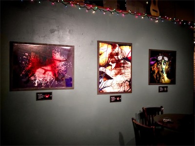 Cult of Ego II | Gallery Photo | Lost Leaf — I think this is the only regular wall they had in the space for hanging artwork. It almost doesn't look as good. It's kind of boring. Which is funny, since it's a bar and not a gallery. Although, every place in downtown Phoenix put their walls up for artists to hang in. Man, that's some personal crap up on the wall there. And the first two of those, I certainly made them abstract enough so that you might not know what the hell it is you're looking at. But those are pretty explicit if you do know what you're looking at.