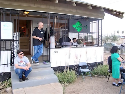 ©haos Gallery Sign — There you go. Hanging up on the front porch cage. A bit higher up so it's easier to see from a distance. That was officially the sign for our gallery.