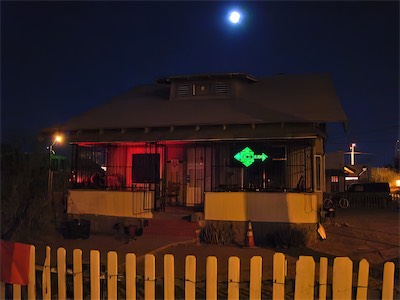 ©haos Gallery Sign — Another front shot. Little bit more light in the photo. It's still quite visible, even with all the street lights going.