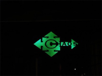 ©haos Gallery Sign — A shot framed just to show the symbol itself, as best as the camera I had at the time was able to do so. Kind of looks like it's just floating in the dark.