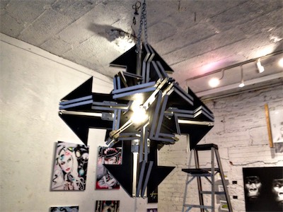 Chaos Scuplture II — Now hung from a chain by two eye hooks. This is at the Ice House in downtown Phoenix, during a big group show, where I had a bunch of art on the wall and the sculpture hanging from the ceiling. I also installed a light bulb in the center of it, an idea which led me to think that I want to make this out of either glass or some kind of plastic sheeting that with frosted edges, that will gather the light and look like a big chaos lamp.