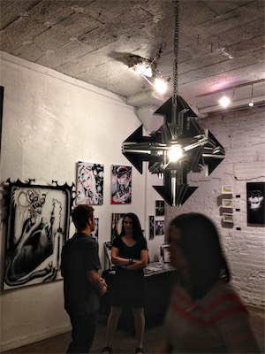 Chaos Scuplture II — And a shot while the show was on, with people walking around and artwork on the walls. No, that's not my artwork. My artwork is to the left of that. I don't know if I actually framed my artwork into a shot with it. What a strange thing to not do. It was a weird time.