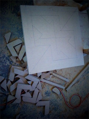 Chaos Sculpture II | Drawing Cuts 1 — Something you don't really get to do too much in the same way with digital art is show your process. And for some reason, when I was basically running ©haos Gallery, I was very, very big on documentation. So, I documented building this sculpture, and here's the first part. A square cut with everything that needs to be cut into it, drawn out, ready to be cut.