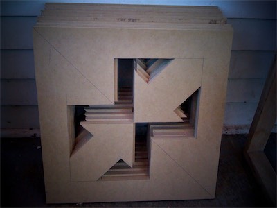 Chaos Sculpture II | Drawing Cuts 1 — Part of the drawing cuts, cut out for to see in all of the wood sheets. I still have yet to do the smaller arrows, and then horizontally cut the whole thing in half, which would give me all the big arrows and small arrows in a single square. The design is a bit ingenious.