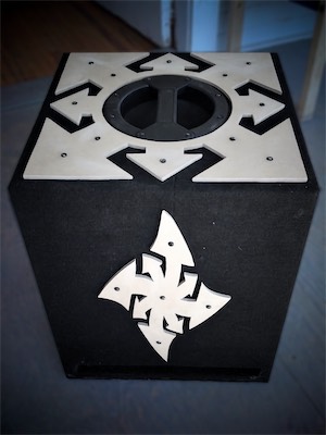 Chaos Subwoofer — Side view showing the Twisted Chaos variant. I'm pretty sure I created these in either Photoshop or Illustrator, and then printed it out and used that as a template. I had been doing this kind of thing at The Firehouse for simple sculptures, and it just seemed to fit decorating a sub. As long as it's screwed in enough and doesn't rattle, which it probably won't on carpet, it really adds to the aesthetic.