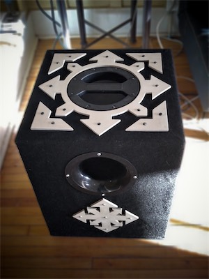 Chaos Subwoofer — And what do we have here? Anything look familiar? I took a design, and I decided I wanted to do a variant of it instead. But this time, in the physical world. And so I took that top chaos symbol, redesigned it, chopped it up a bit, and put it back together as a new chaos symbol on the top. I think that adds a bit of refinement.