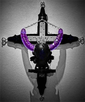 Sacred the Munny — Tight framing front shot. Camera I had? Yeah. Not the greatest. The colors are great though. That purple is really popping right now. Funny note, that double-ended dildo turned brown over time. Somebody did buy the sculpture, and eventually gave it back to me. And when I got it back, those things were ruined. Not because of UV, just time. Still haven't found a replacement for them.